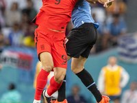 Guesung Cho , Diego Godin  during the World Cup match between Spain v Costa Rica, in Doha, Qatar, on November 23, 2022. (