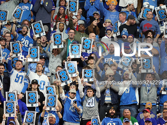 Fans cheer with third down signs during an NFL football game between the Detroit Lions and the Buffalo Bills in Detroit, Michigan USA, on Th...