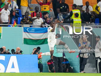 (11) of Ghana team celebrate on way CRISTIANO RONALDO after score second goal during FIFA World Cup Qatar 2022  Group H football match betwe...