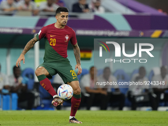 Joao Cancelo Left-Back of Portugal and Manchester City controls the ball during the FIFA World Cup Qatar 2022 Group H match between Portugal...