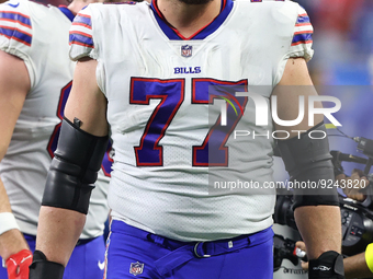 Buffalo Bills offensive tackle David Quessenberry (77) walks off the field after the conclusion of an NFL football game between the Detroit...