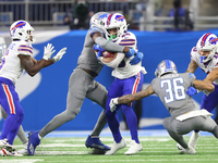 Buffalo Bills running back Nyheim Hines (20) runs the ball during the second half of an NFL football game between the Detroit Lions and the...