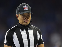 Referee Tony Corrente (99) is seen during the second half of an NFL football game between the Detroit Lions and the Buffalo Bills in Detroit...