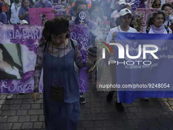 Mothers of victims of feminicide, relatives of disappeared persons and various feminist collectives demonstrate in the Zócalo of Mexico City...