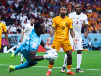 Memphis Depay (NED), Hassan Abdelkarim (QAT) during the World Cup match between Netherlands v Qatar , in Doha, Qatar, on November 29, 2022....