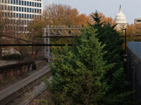 The U.S. Capitol is seen beyond railway tracks in Washington, D.C. on November 29, 2022 as Congress prepares to act to avoid a potential nat...
