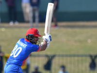 Afghanistan's Rahmat Shah plays a shot during the final one-day international cricket match between Sri Lanka and Afghanistan at the Palleke...