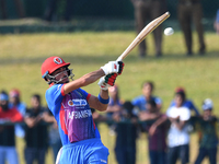 Afghanistan's Ibrahim Zadran  plays a shot during the final one-day international cricket match between Sri Lanka and Afghanistan at the Pal...
