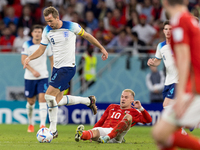 Harry Kane , Aaron Ramsey  during the World Cup match between Wales vs England in Doha, Qatar, on November 29, 2022. (
