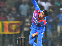 Afghanistan’s Mujeeb Ur Rahman  delivers a ball during the final one-day international cricket match between Sri Lanka and Afghanistan at th...