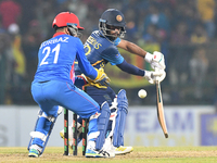 Sri Lanka’s Kusal Mendis  plays a shot during the final one-day international cricket match between Sri Lanka and Afghanistan at the Palleke...