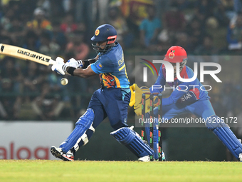Sri Lanka’s Charith Asalanka plays a shot during the final one-day international cricket match between Sri Lanka and Afghanistan at the Pall...