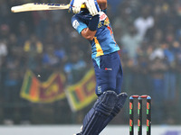Sri Lanka’s Dunith Wellalage plays a shot during the final one-day international cricket match between Sri Lanka and Afghanistan at the Pall...