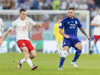 Piotr Zielinski , Alexis Mac Allister  during the World Cup match between Poland vs Argentina in Doha, Qatar, on November 30, 2022. (