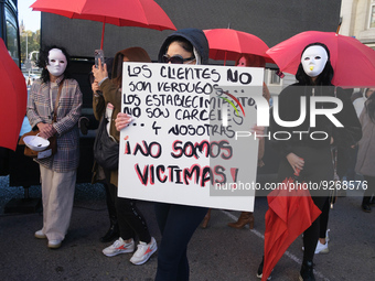 Demonstrators protest against the abolition of prostitution in front of the Congress of Deputies, on December 1, 2022, in Madrid, Spain. The...
