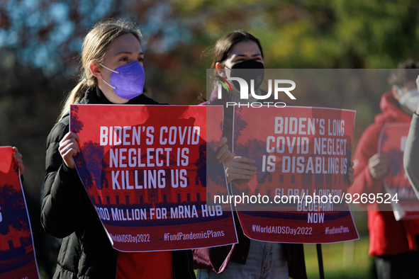 Demonstrators gather outside of the White House in Washington, D.C. on World AIDS Day, December 1, 2022 for a protest hosted by The Myalgic...