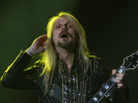 

Richie Faulkner, the guitarist of British band Judas Priest, is performing on stage during the second day of the Hell and Heaven Metal Fes...