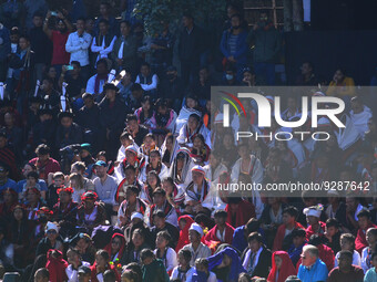 Spectators watch the cultural performance during the North East Zone Cultural Centre (NEZCC) cultural show on the seventh day of the Hornbil...