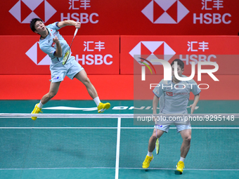 Takuro HOKI and Yugo Kobayashi of Japan compete in the Men's Doubles against Fajar ALFIAN and Muhammad Rian ARDIANTO of Indonesia on two one...