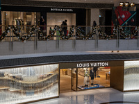 A Bottega Veneta and a Louis Vuitton Store inside a Shopping mall on December 9, 2022 in Hong Kong, China. (