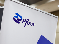 Pfizer logo is seen during the job fair, organized mainly for Ukrainian refugees, in Krakow, Poland on December 8, 2022. (