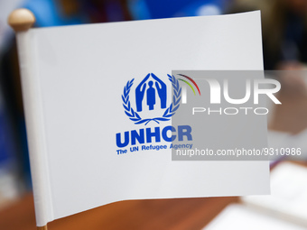 UNHCR logo is seen on a flag during the job fair, organized mainly for Ukrainian refugees, in Krakow, Poland on December 8, 2022. (