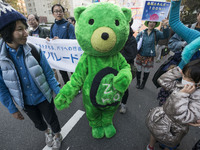 Earth Parade 2015 Tokyo started from Hibiya Open-Air Concert Hall to manifest the climate problems in the world, on November 28, 2015. Just...