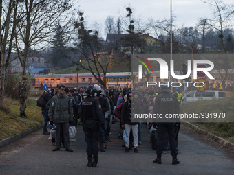 Migrants wait to be allowed to cross to Austria, in Sentilj, Slovenia. About 5,000 migrants are reaching Europe each day along the so-called...
