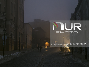 Historical part of Kyiv during heavy fog and power outage after a massive Russian missile attack on Ukrainian power infrastructure in Kyiv,...