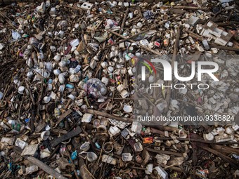 A view of a river covered by garbage in Bogor, West Java, Indonesia, on Wednesday, December 17, 2022. The Earth is literally covered in wate...