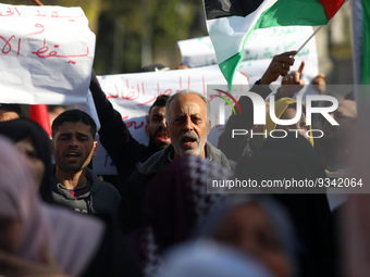 Palestinians take part in a protest in front of the United Nations Educational, Scientific and Cultural Organization (UNESCO) headquarters i...