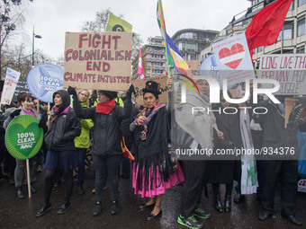 More than 60 thousand people rally along the street of central London, on November 29, 2015 taking part to the demostration against the clim...