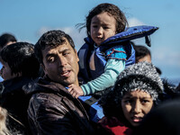 Migrants approach the coast of the northeastern Greek island of Lesbos on Thursday, Nov. 29, 2015. About 5,000 migrants are reaching Europe...