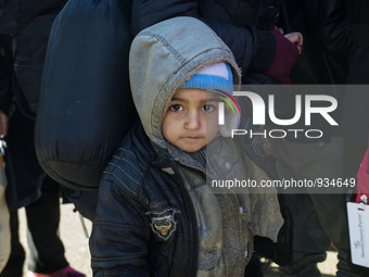 A Syrian child, inside the refugee camp in Sentilj on November 29, 2015. (