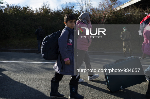 Hundreds of refugees after refreshments and taking warm clothes for the winter, continue their journey across the Slovenian border arriving...