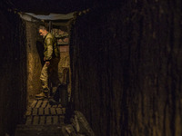 An ukrainian soldier in his underground shelter in the Zaporizhia region. Shelling from russian positions are constant, so, they have to liv...