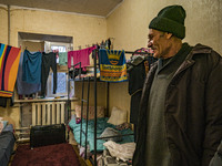 An ukrainian refugee from the russian occupied city of Orihiv in a shelter in Zaporizhia, Ukraine. Many people moved out of the russian occu...