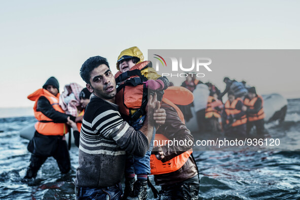Migrants approach the coast of the northeastern Greek island of Lesbos on Thursday, Nov. 30, 2015. About 5,000 migrants are reaching Europe...