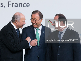 United Nations Secretary General Ban Ki-moon (C) and French President Francois Hollande (R) arrival for the opening of the UN conference on...