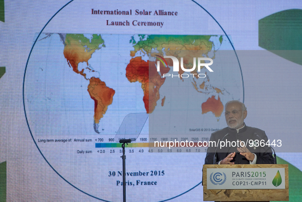 India's Prime Minister Narendra Modi speaking during the Heads of State media event on carbon pricing, as part of the COP21 United Nations c...