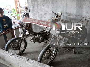 A boy looks motorcycle wreck due of the 2010 eruption of Mount Merapi which were exhibited at the Citizen Museum during holiday for the end...
