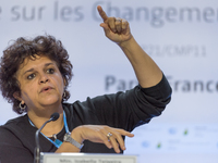 Brazilian Environment Minister Izabella Teixeira delivers a speech during the United Nations Conference on Climate Change COP21, on December...