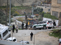 Israeli bulldozers demolish Palestinian house in the East Jerusalem neighborhood of Silwan on January 4, 2023. Israeli authorities today kno...