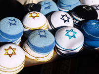  Kippah caps are sold on a street market in the Jewish Quarter of the Old City in Jerusalem, Israel on December 29, 2022. (