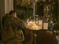 Ukrainian Serviceman during Orthodox Christmas service in St. Volodymyr Cathedral in Kyiv, Ukraine, January 6, 2023 (
