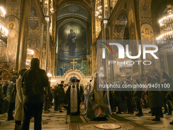 People pray during Orthodox Christmas service in St. Volodymyr Cathedral in Kyiv, Ukraine, January 6, 2023 (