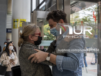 A man hugs his mother as they meet for the first time in 3 years outside Futian Port on January 8, 2023 in Shenzhen, China. Hong Kong today...