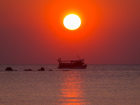 A ferry during a sunset near Old Jaffa at the Mediterranean Sea in Tel Aviv, Israel on December 30, 2022. (