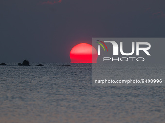 A sunset seen from Charles Clore Beach at the Mediterranean Sea in Tel Aviv, Israel on December 30, 2022. (