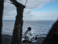 Migrants approach the coast of the northeastern Greek island of Lesbos on Thursday, Dec. 3, 2015. About 5,000 migrants are reaching Europe e...